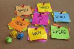 Sticky notes with who, what, when, where questions about choosing a storage facility unit